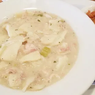 Chicken and dumplings and carrots.