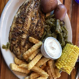 Grilled Catfish Entree, comes with a choice of 3 sides.