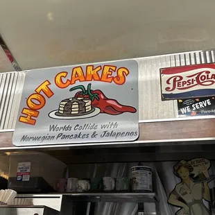 a sign for hot cakes