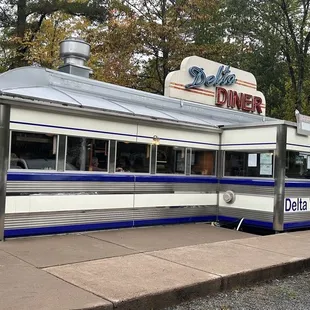a car parked in front of the diner