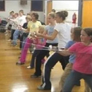 Beginners' fencing class in progress
