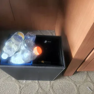 Very small Trash can/ recycle can.