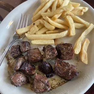 steak and fries on a plate