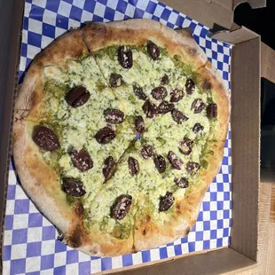 Pesto, feta and kalamata olives.