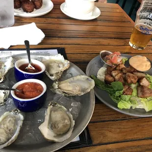 $1 oysters and shark bites (tuna)