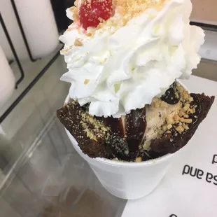 P-nut butter chocolate chip brownie sundae. Whip and nuts 25 cents each and the hard brownie sundae is $8.05 before tax