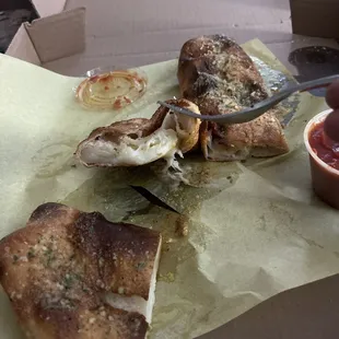 Drenched in grease and soggy I ordered a pepperoni/mushroom Stromboli and received a cheese only Stromboli. FAIL!!!