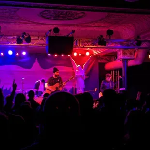 a band playing on stage