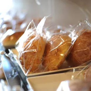 a variety of baked goods wrapped in plastic