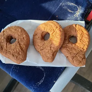 The plain cake donut with the handle.