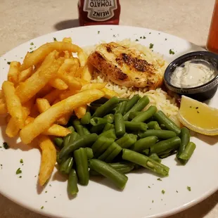 Halibut plate $12.99 also comes with soup or salad.