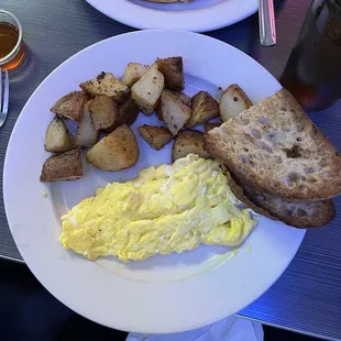 Scrambled eggs, home fries, toast