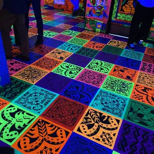 people standing in a brightly lit room