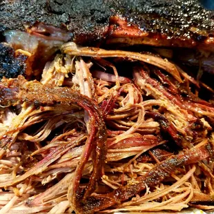 ows a pile of pulled pork
