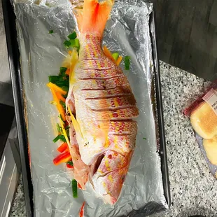 a whole fish in foil