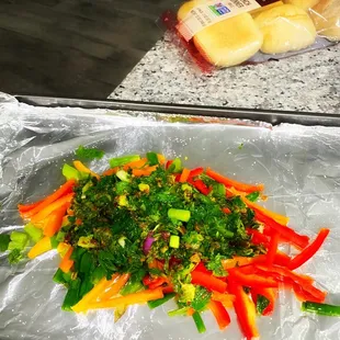 a tray of vegetables and cheese