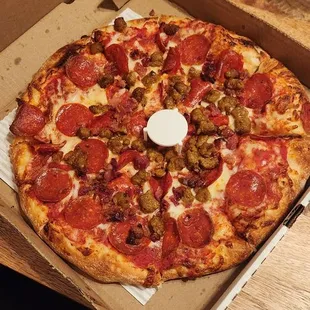 Large pepperoni, sausage, &amp; bacon pizza. My kids enjoyed it.