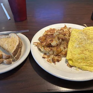 an omelet and toast on a plate