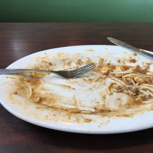 a dirty plate of food