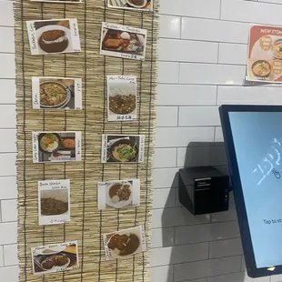Pics of food next to ordering kiosk