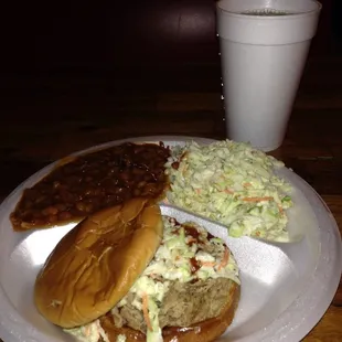 Pork sandwich plate, two large portioned sides and all you can drink sodas or tea! 9$