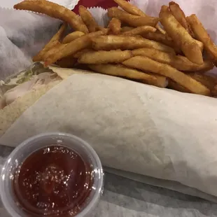 Gluten free turkey wrap with fries