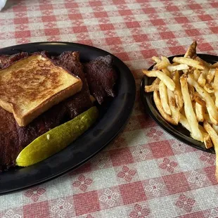 Half rack or ribs, fresh cut fries and baked beans