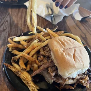 Pork &amp; brisket sandwich with awesome fries