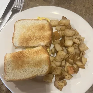 Combinations  two eggs with toast and home fries