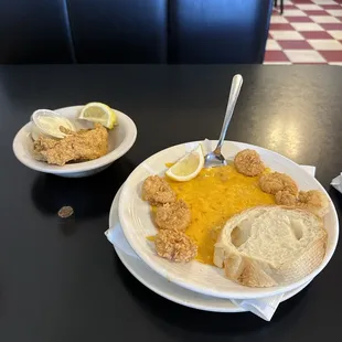 Seafood stuffed potato with a side of catfish