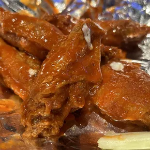 Chicken wings. Overdone but tolerable