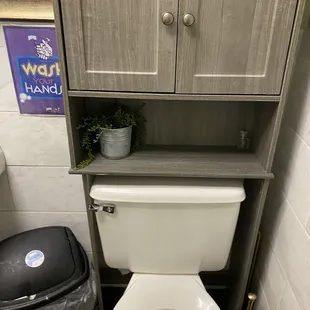 Toilet. Good cabinet space