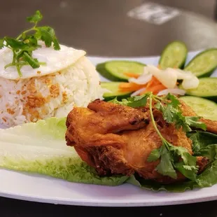 Fried hen with rice and runny egg