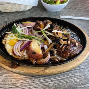 The sizzling plate filet mignon