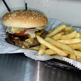 10 oz (over 1/2 lbs) bacon cheeseburger with side of French fries.