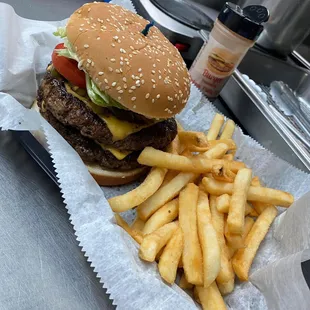 Double cheeseburger combo with French fries.