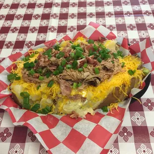 Loaded pork baked potato. Good choice!