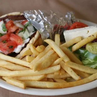 a plate of fries and a sandwich