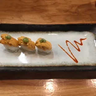 Uni and ikura with quail egg...