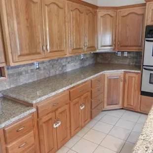 a kitchen with granite counter tops