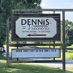 a sign for dennis winery