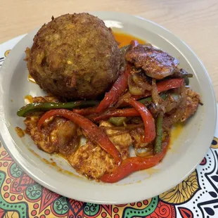 Chicken mofongo with peppers and onions
