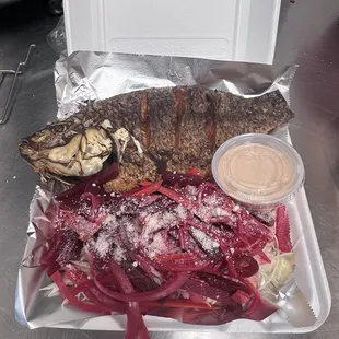 Fried fish with plantain sliced