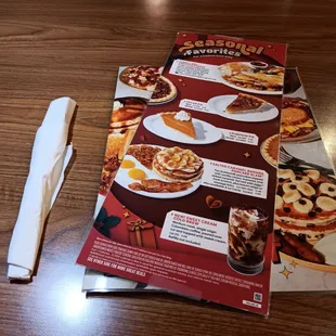 Clean menus, clean table. Lovely atmosphere with some lofi jazz playing.