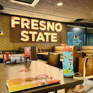 a table and chairs in a restaurant