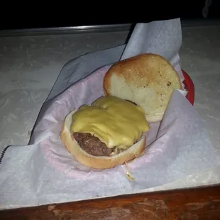 $1.50 1/2 pound cheeseburger. Amazing.