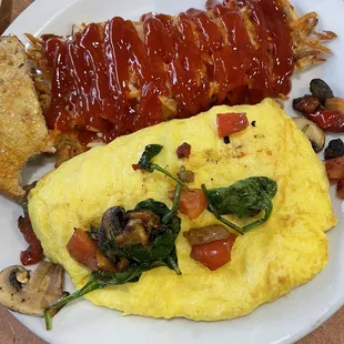 Loaded Veggie Omelette with Hash Browns