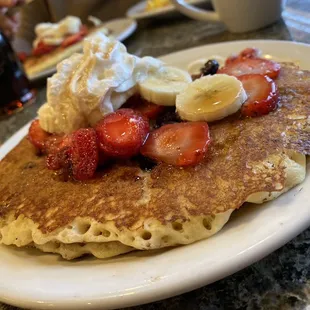 Double berry banana pancakes!! Oh my!! Doesn&apos;t it look delicious!!