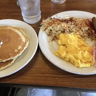 Grand slam $6.99 - 2 eggs, 2 cakes, 2 bacon, 2 sausage, plus hash browns