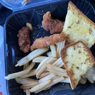 a tray of fried chicken and french fries